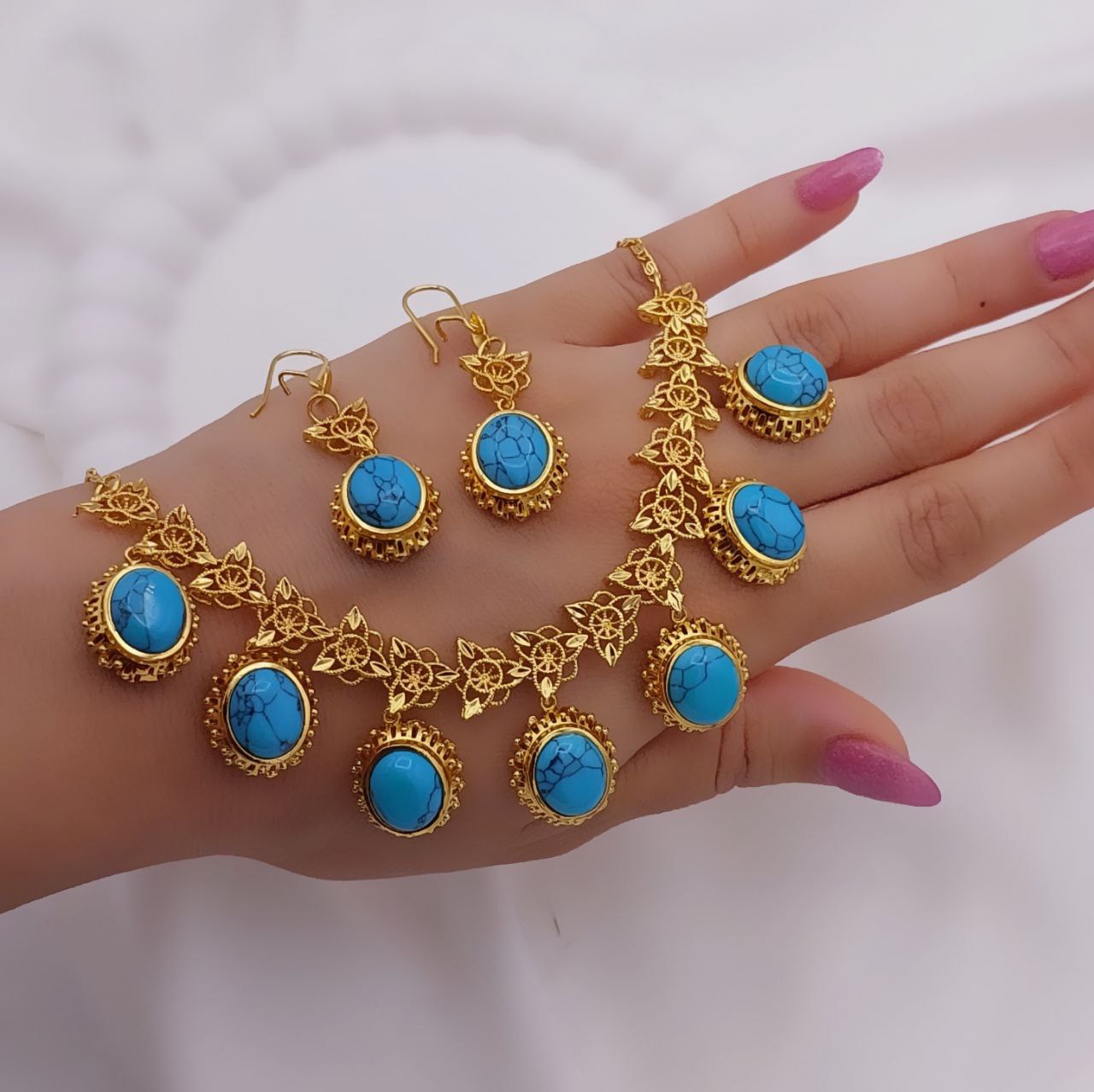 نیم‌ست زنانه فیروزه‌ای طرح طلا