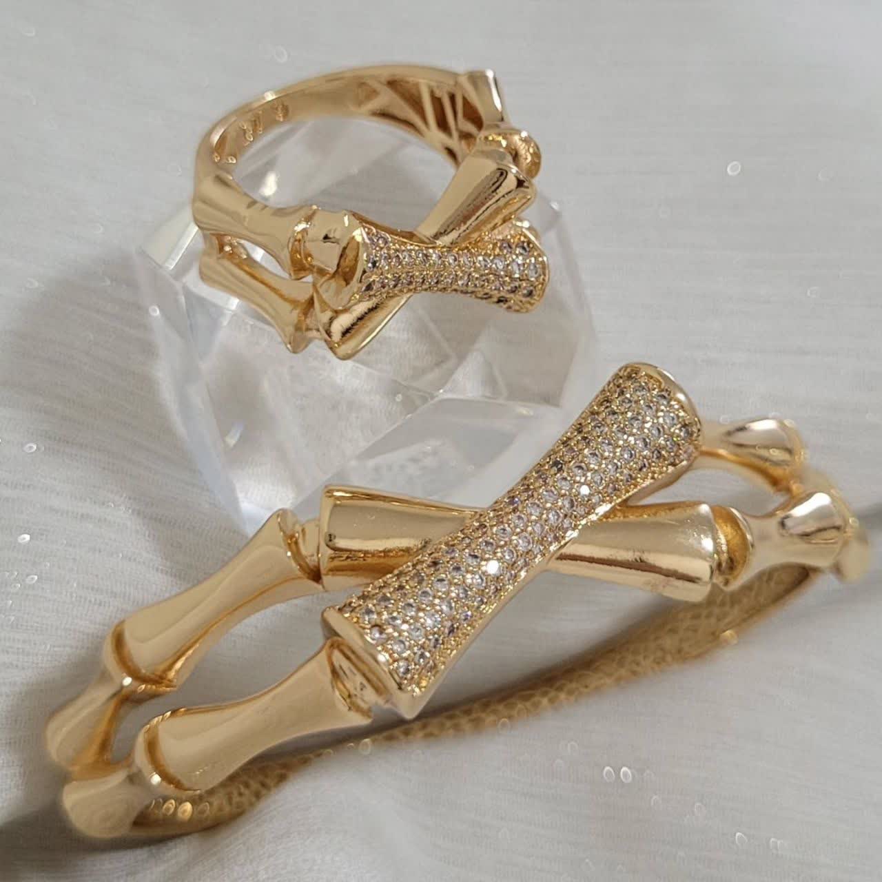 ست دستبند و انگشتر مفصلی ژوپینگ با طراحی استخوانی براق و نگینکاری یکدست