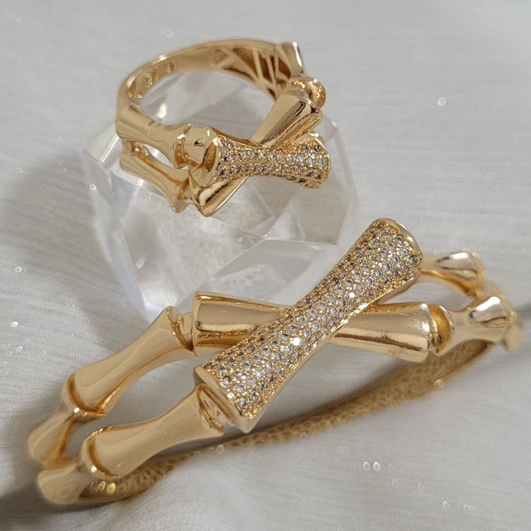 ست دستبند و انگشتر مفصلی ژوپینگ با طراحی استخوانی براق و نگینکاری یکدست